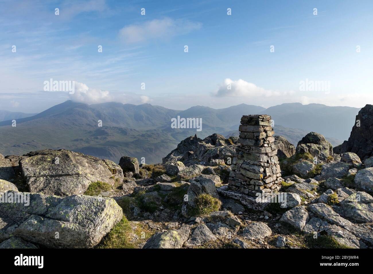 The Summit Trig on Harter Fell with the View Towards the Scafell Range, Lake District, Cumbria, UK Stock Photo
