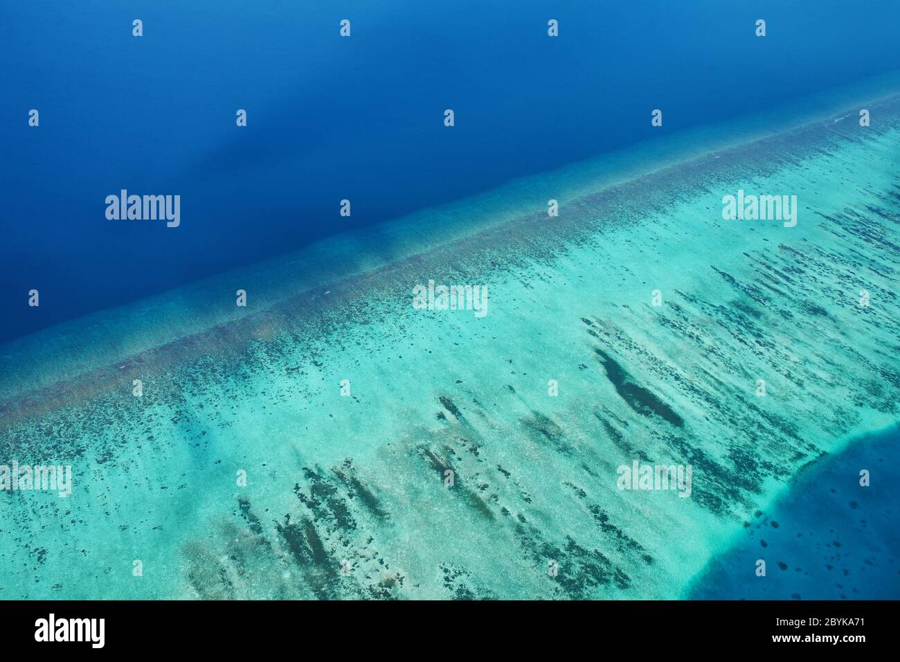 Atolls and islands in Maldives from aerial view Stock Photo