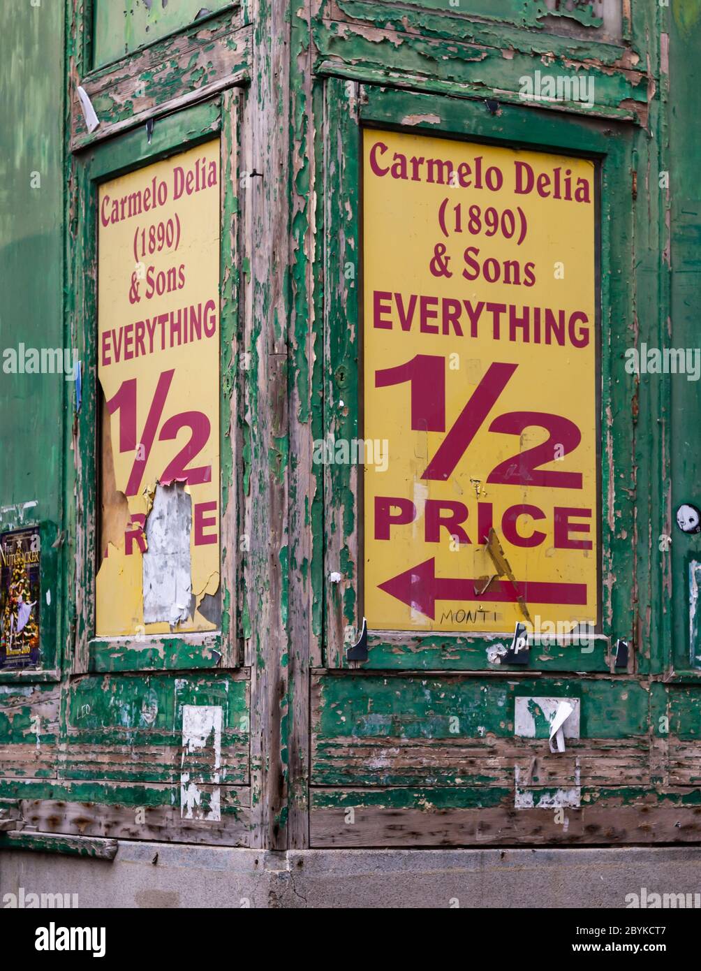Everything at half price. Weathered sign on a store in Malta Stock Photo