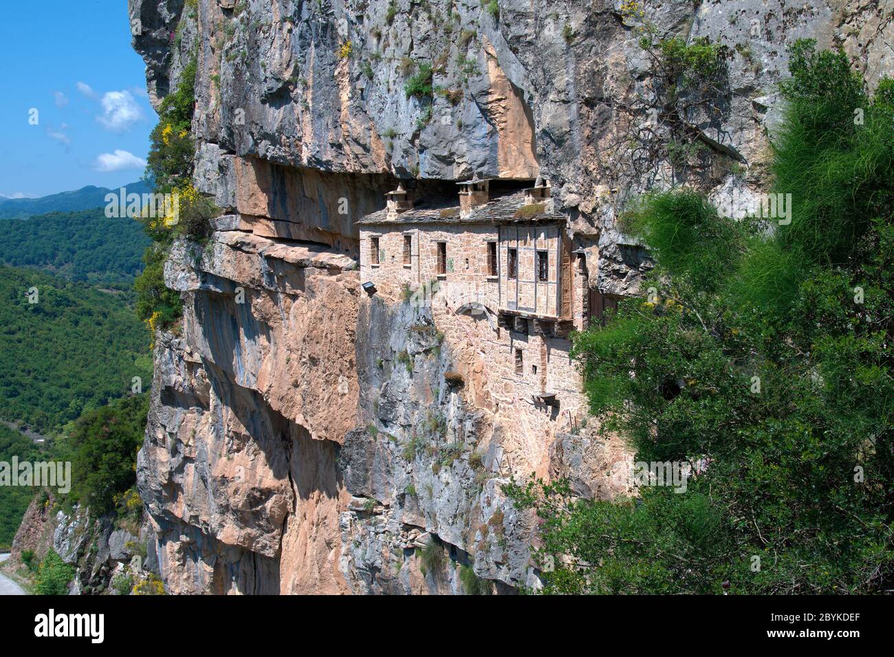 Greece, Epirus, public Monastery Kipinas built in 13th Century into rock face Stock Photo