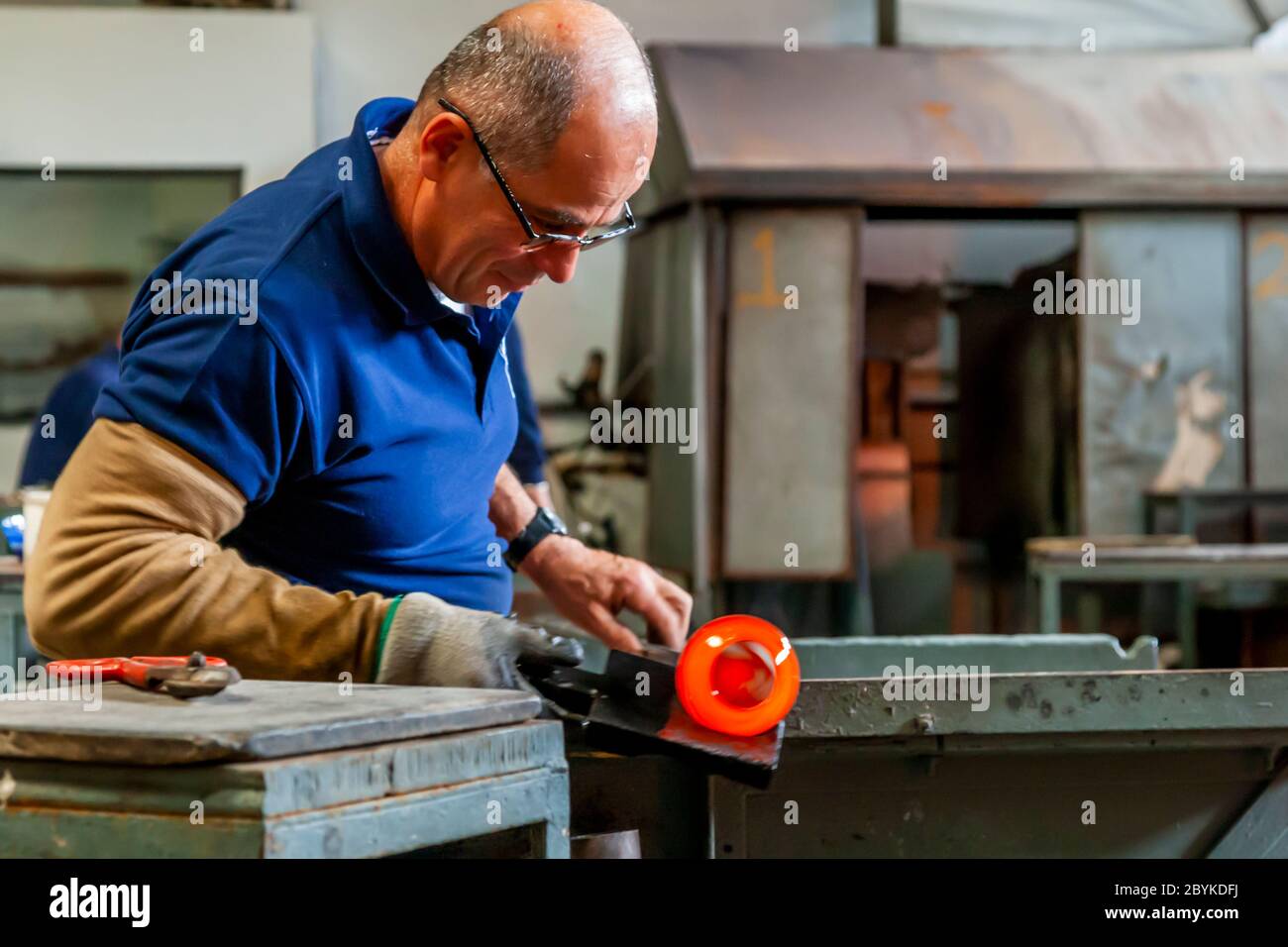 Glassblower at work in Malta Stock Photo