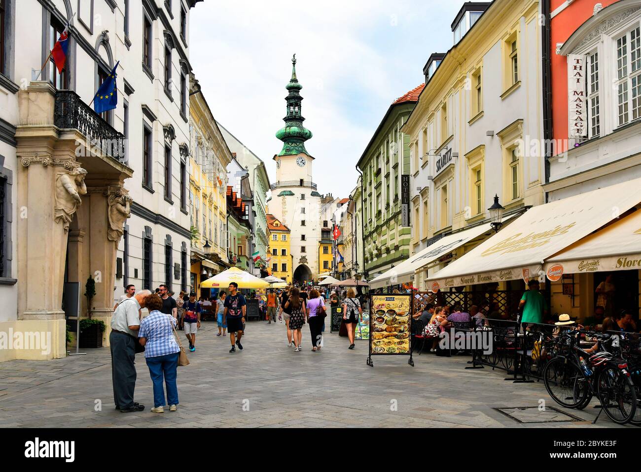 Bratislava, Slovakia - July 21, 2019: Unidentified people, shops, restaurants and Michael's Gate aka Michalska Tower in the capital of Slovakia Stock Photo
