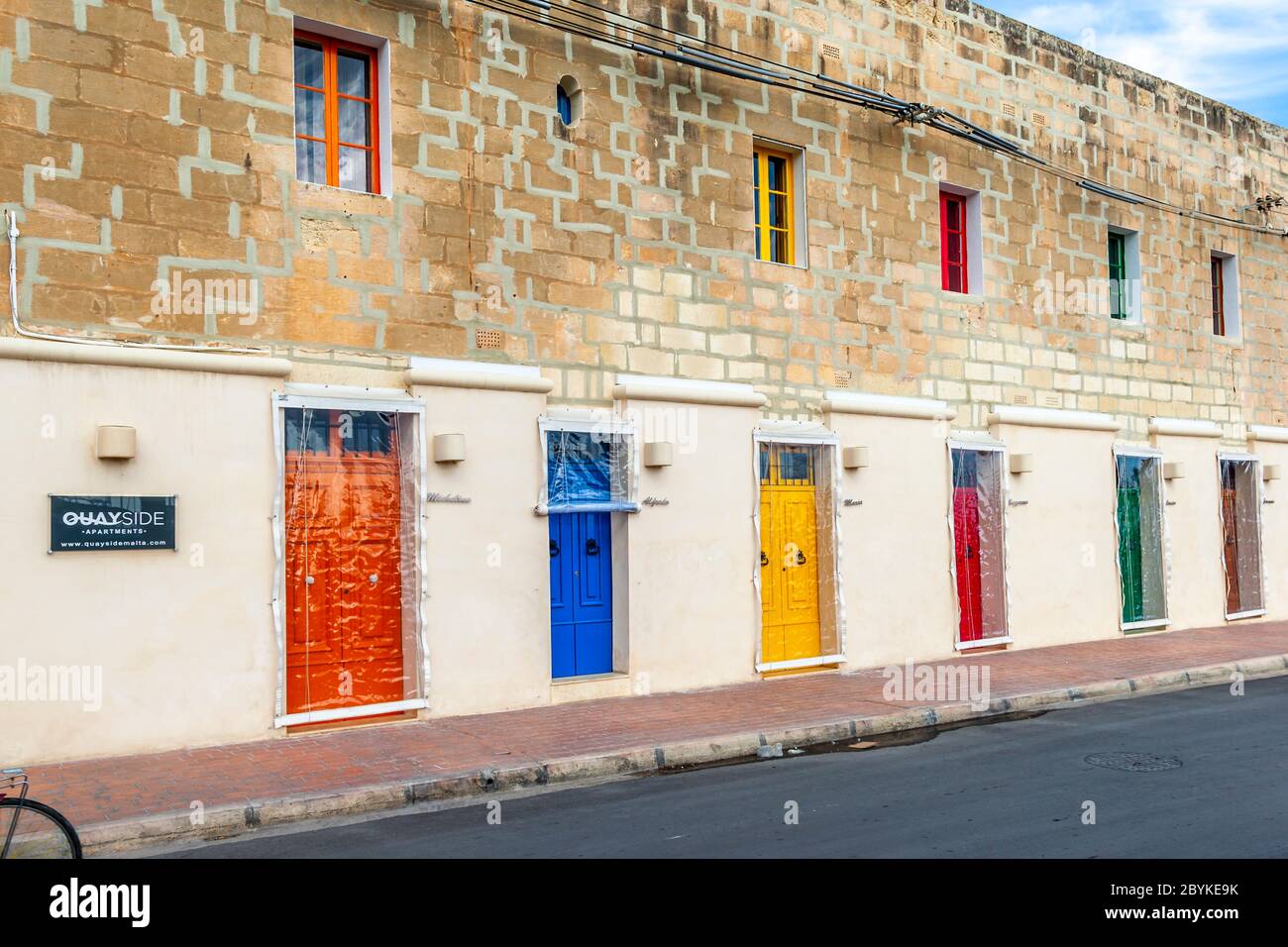 Colorful doors and window frames in Marsaxlokk, Malta Stock Photo