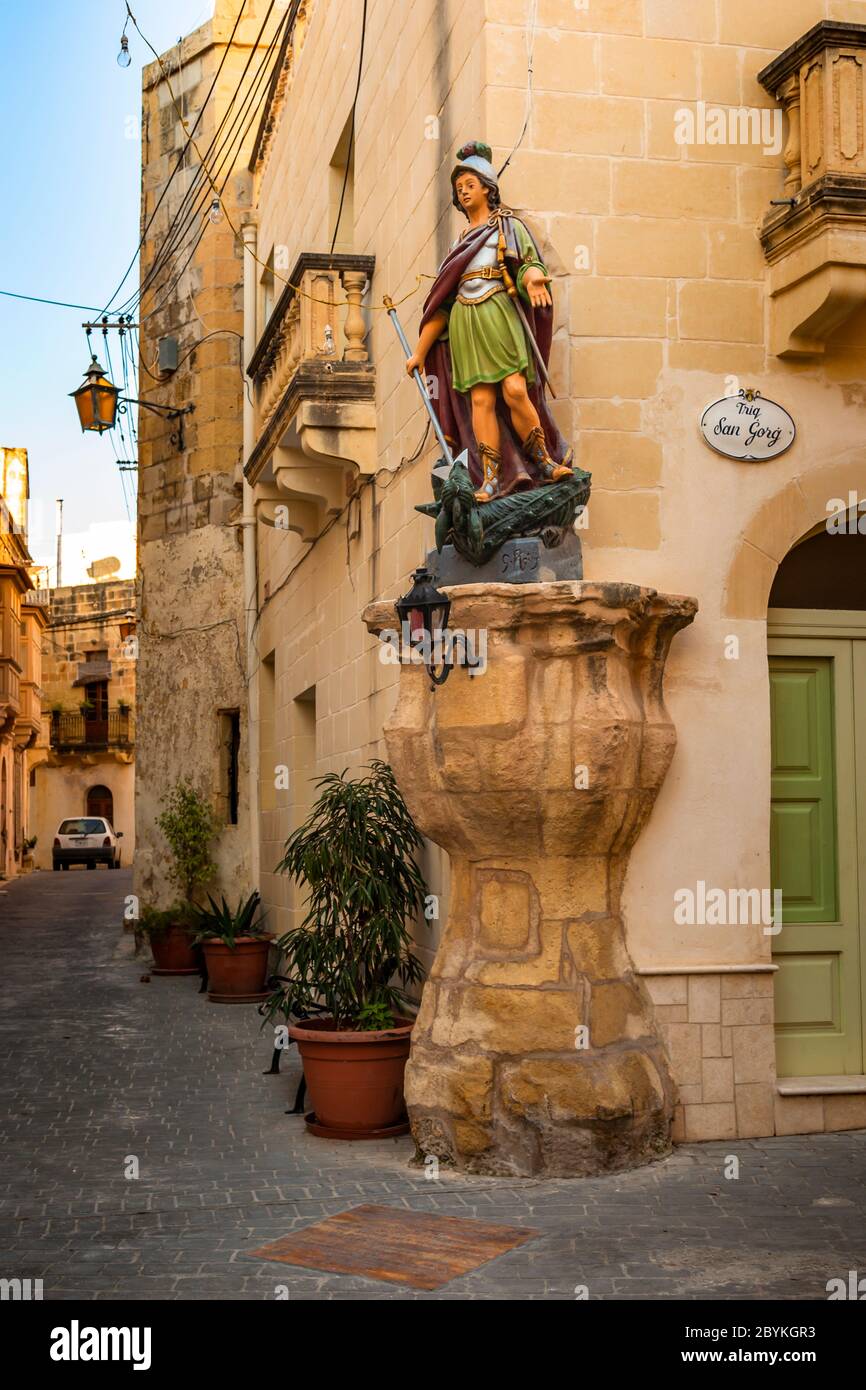 Statue of St. George on the corner of a house in Malta Stock Photo