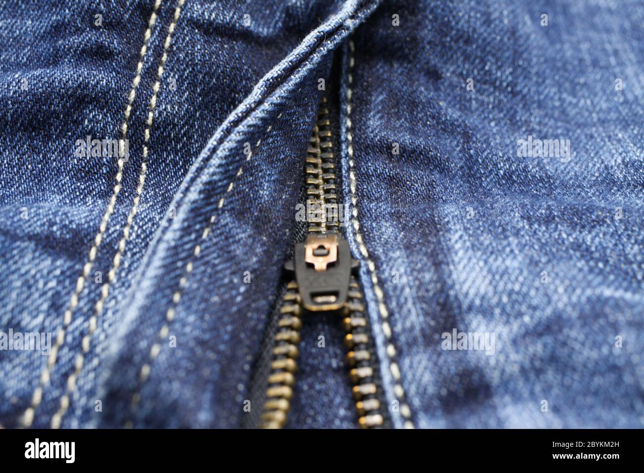 Macro close up of isolated blue casual denim jeans pants with metal teeth  zipper Stock Photo - Alamy