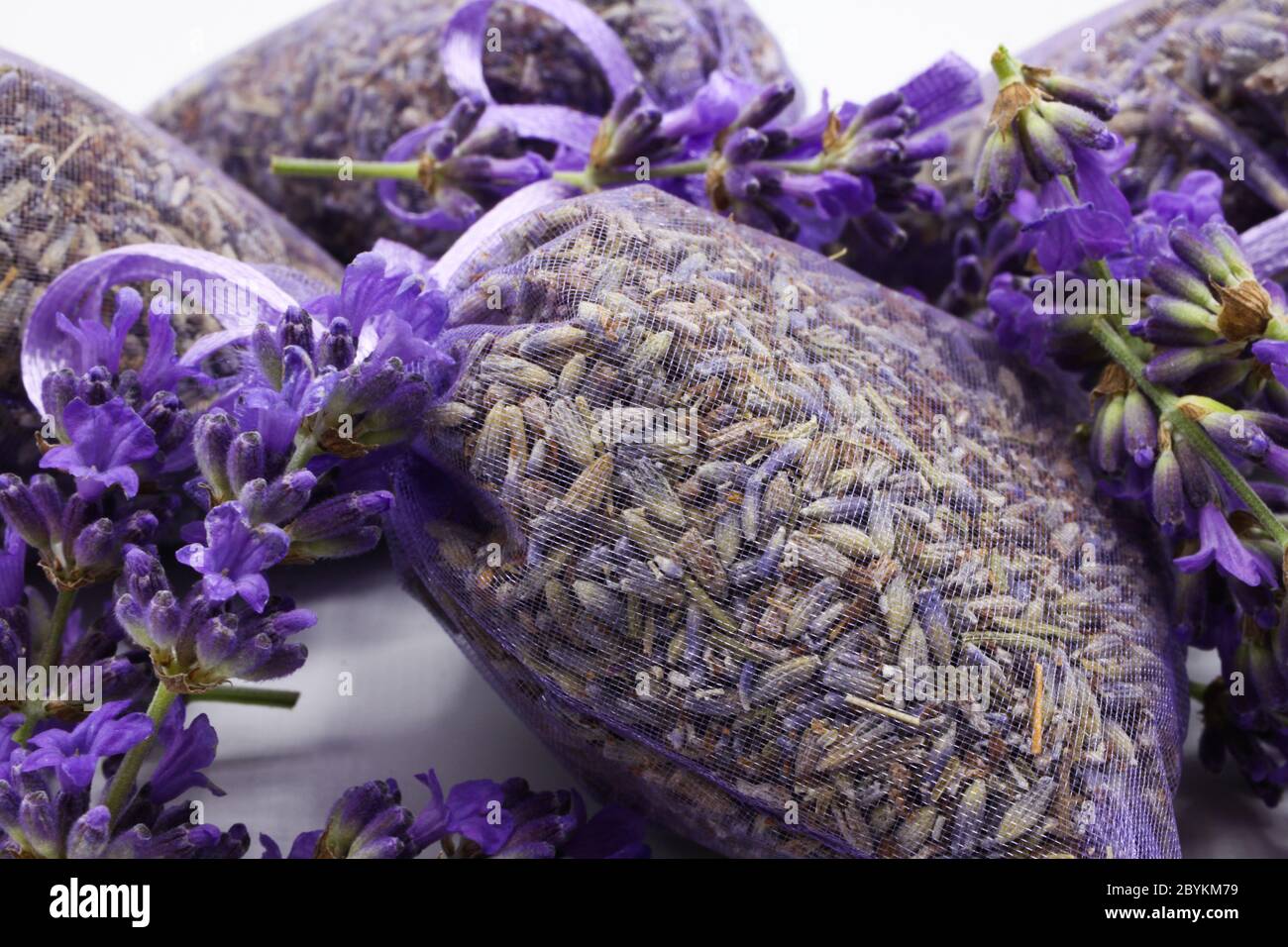https://c8.alamy.com/comp/2BYKM79/close-up-of-isolated-bagged-dried-lavender-blossom-sacs-used-as-moth-repellent-in-wardrobe-for-clothes-protection-white-background-2BYKM79.jpg