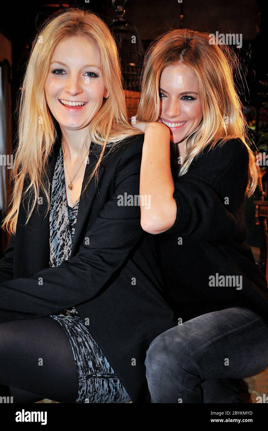 Celebrity sisters Sienna and Savannah Miller pose for their portrait at the launch of their fashion label's latest collection: Twenty8Twelve. London F Stock Photo