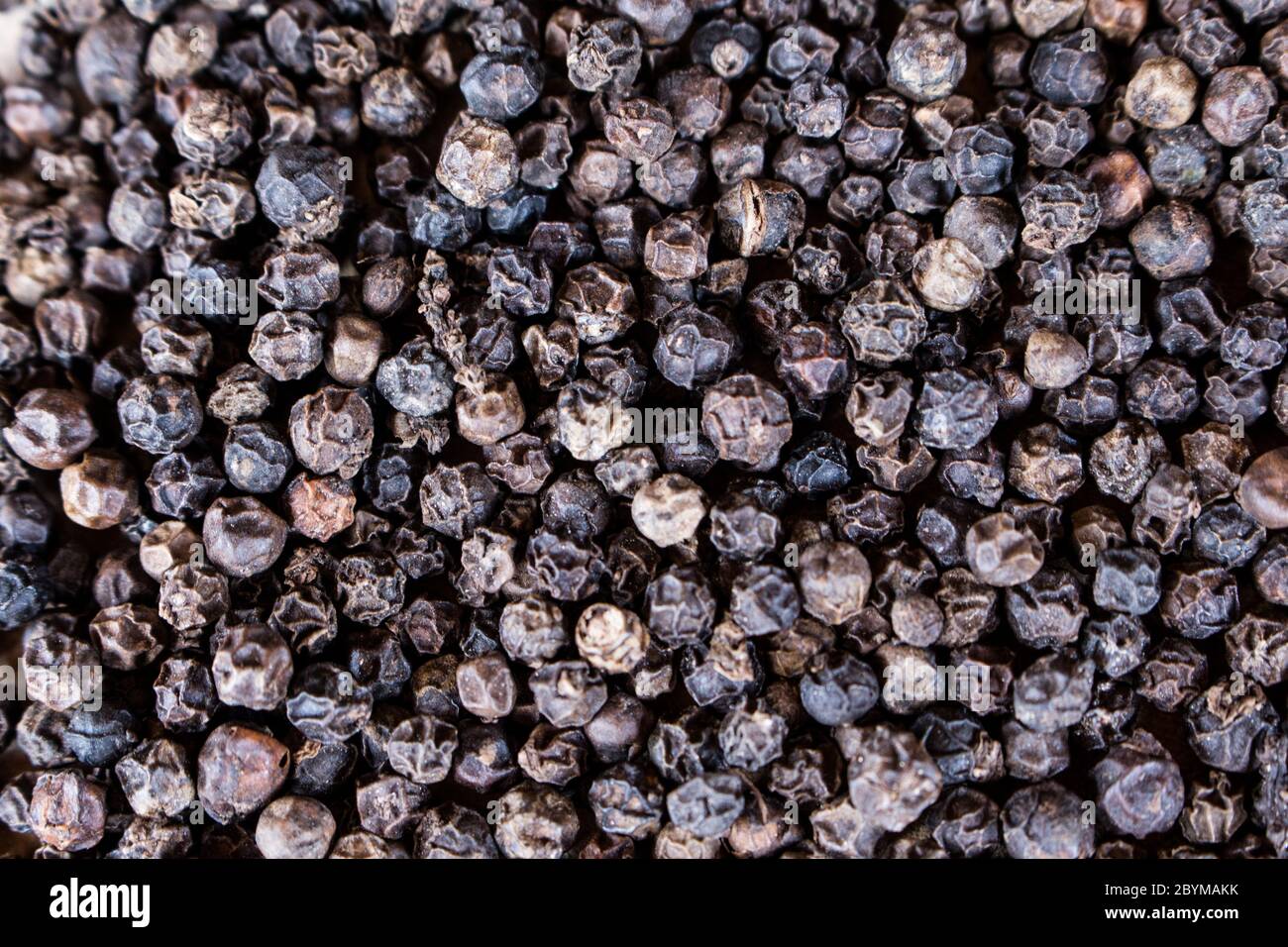 Black peppercorn for cooking background Stock Photo Alamy