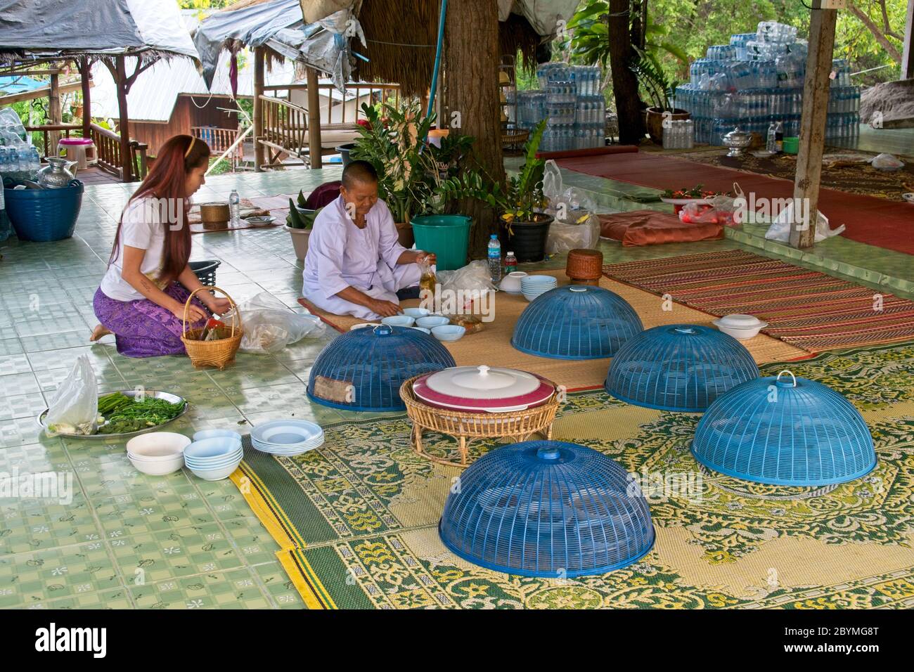 Laying up Buddhist monks food ready for eating. Stock Photo