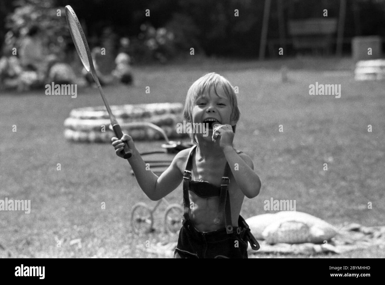12.03.2019, Berlin, , GDR - Boy playing badminton in a kindergarten. 00S840801D011CAROEX.JPG [MODEL RELEASE: NO, PROPERTY RELEASE: NO (c) caro images Stock Photo