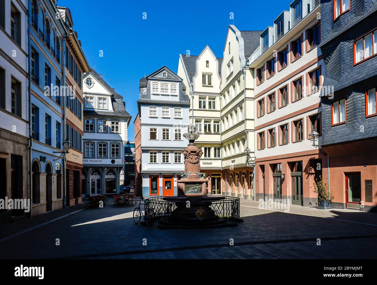 01.04.2020, Frankfurt am Main, Hesse, Germany - New Old Town, chicken market with Friedrich-Stoltze-Fountain, deserted city center during the Corona C Stock Photo