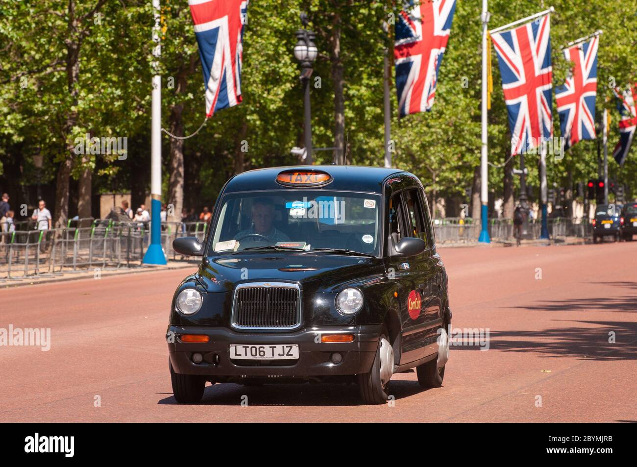 Black taxi cab on the Mall, London, UK Stock Photo