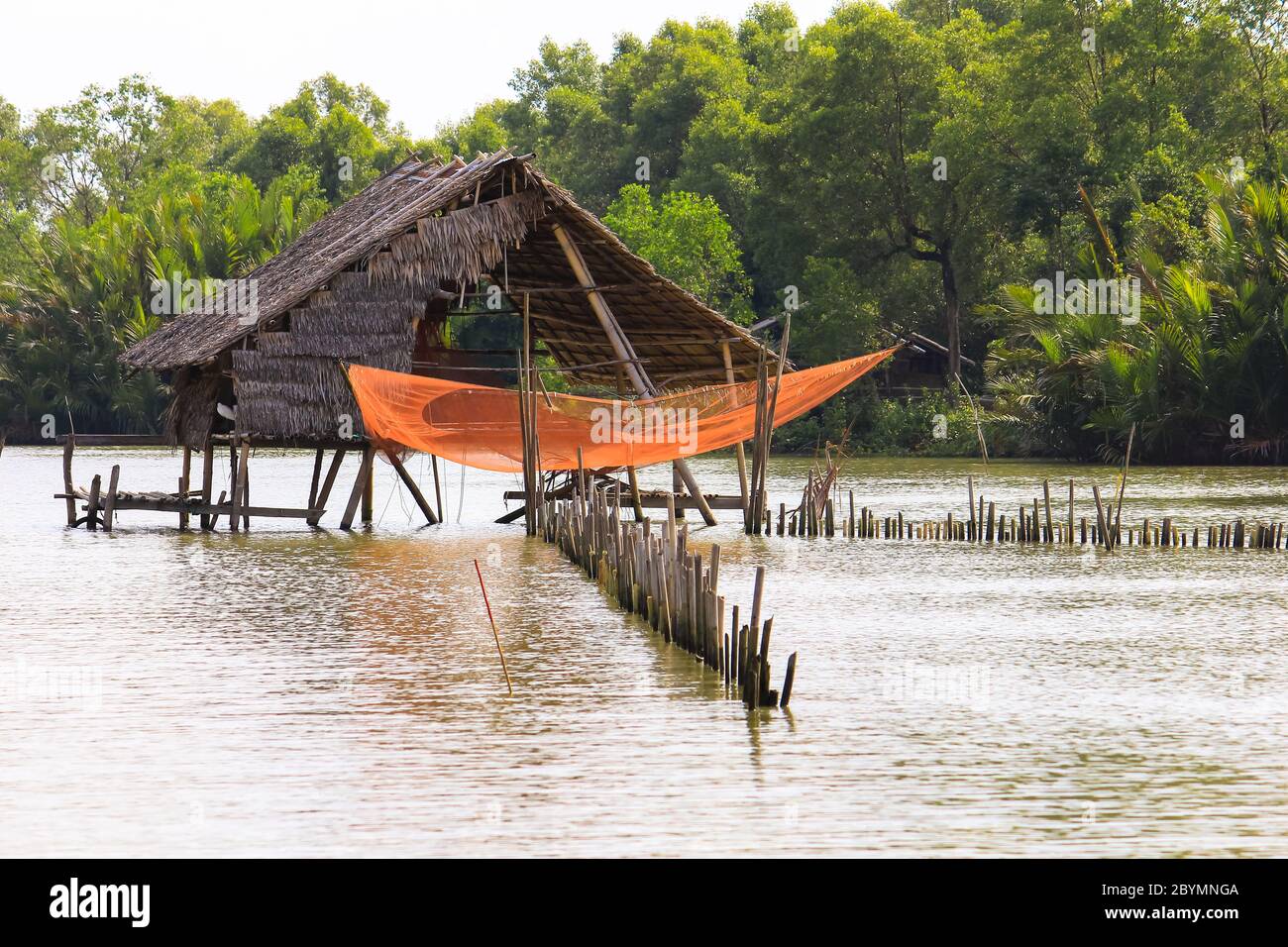 hut in river for fisherman fishing and hunt food Stock Photo