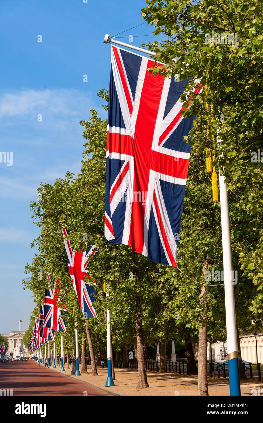 Union Jack flags lining the Mall towards Buckingham Palace for state occasion, London, UK Stock Photo