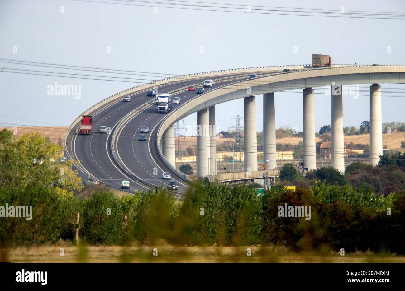 Traffic passes over the Sheppey Crossing Bridge - A249 / M2 to Sheerness, Kent, England. Stock Photo