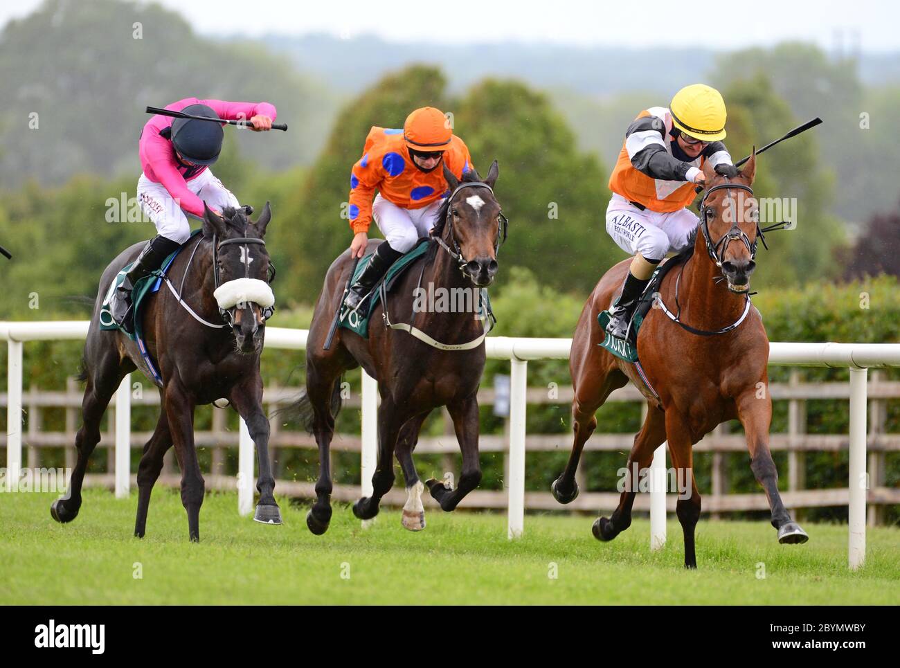 Silence Please and Tom Madden (left) beats One Voice (right) and Shane Foley to win the Listed Irish Stallion Farms EBF Salsabil Stakes at Navan Racecourse, County Meath, Ireland. Stock Photo