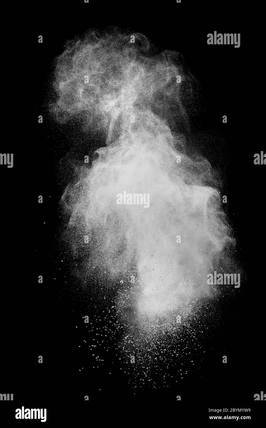White powder explosion isolated on black Stock Photo Alamy