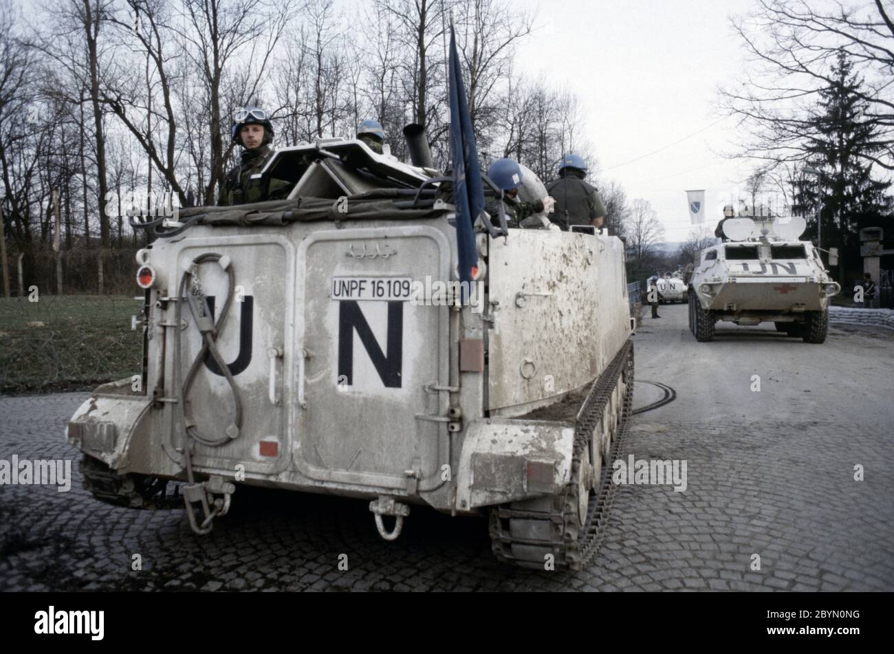 7th March 1994 During the war in Bosnia: a Swedish Häaglunds Pbv (Pansarbandvagn) 302 APC of Nordbat 2 outside the entrance to Tuzla Airport. Stock Photo
