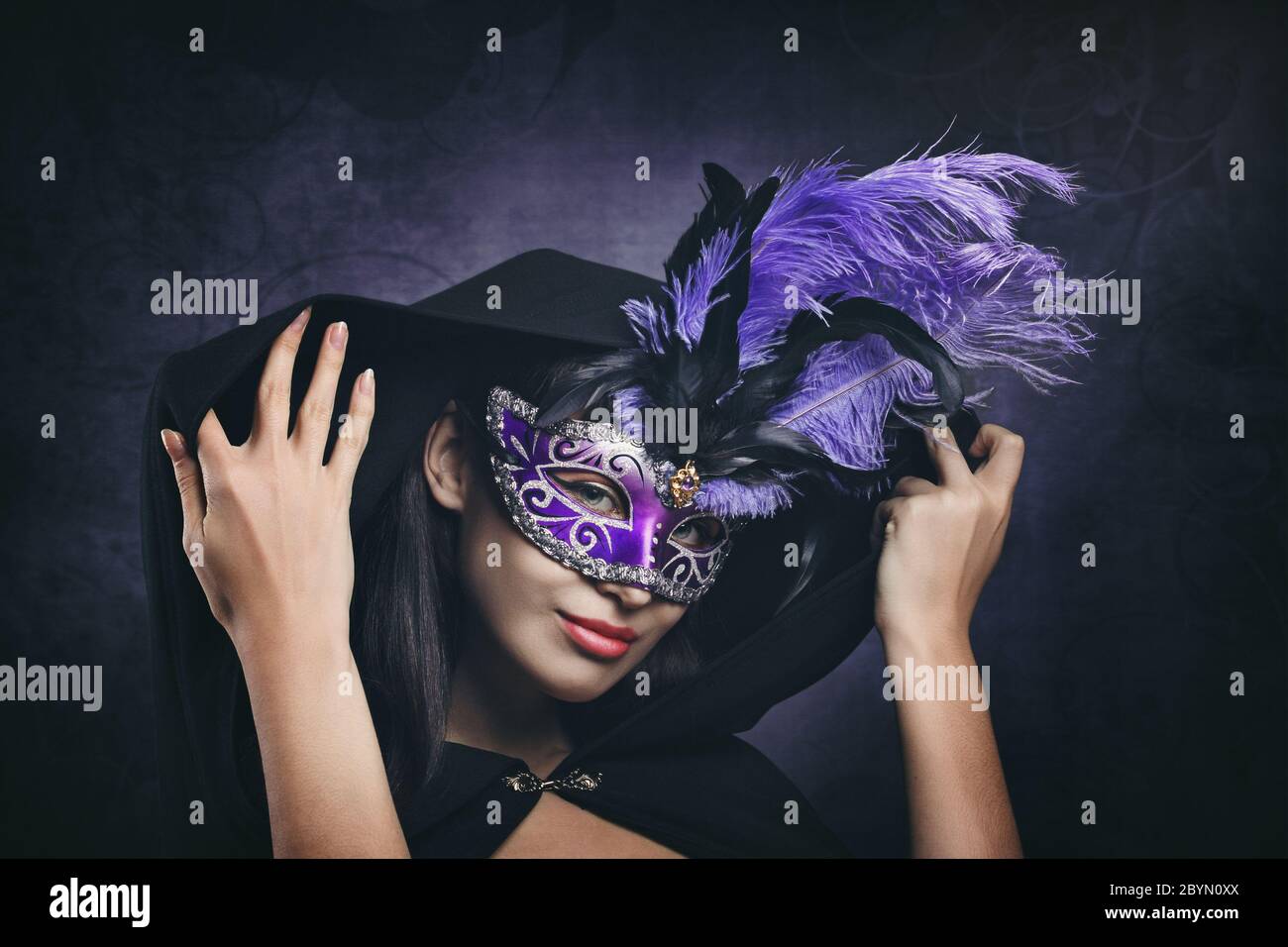 Elegant portrait of a masked woman. Carnival and fantasy Stock Photo