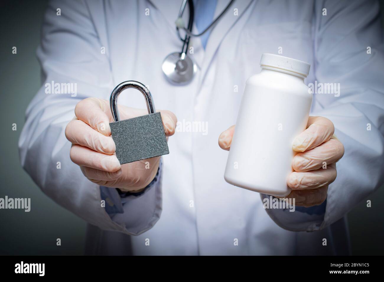 A doctor giving medication treatment options during a virus pandemic Stock Photo
