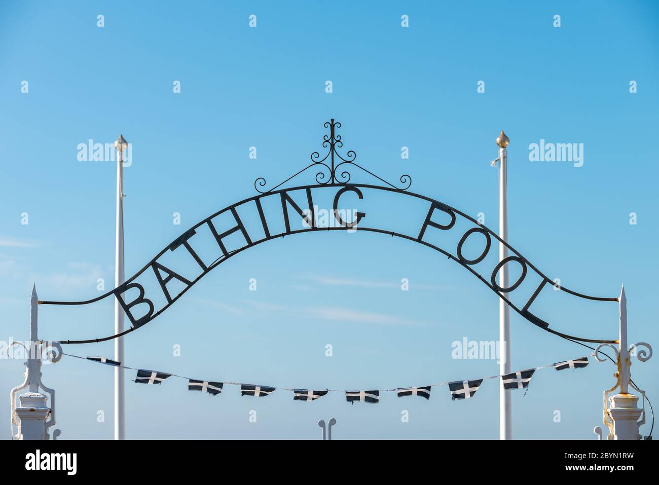 A Bathing Pool sign at the Jubilee Bathing Pool Lido in Penzance, Cornwall, UK. Stock Photo