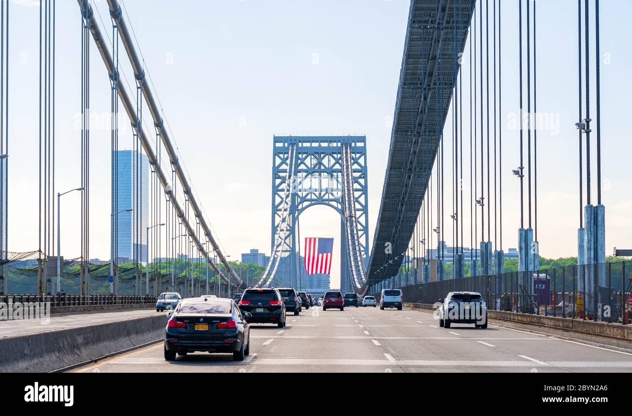 New York, New York - May 25, 2020: George Washington Bridge with the American flag during Memorial Day weekend. Stock Photo