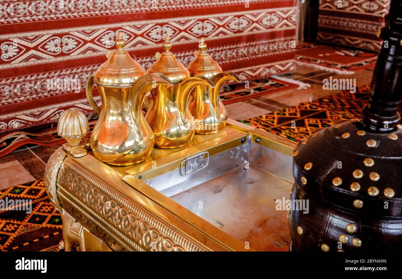 Traditional Arabic Coffee Pot. Tourist tents in Wadi Rum dessert in