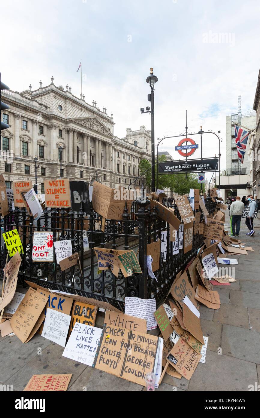 Many protest signs strewn around the entrance to Westminster Station after a Black Lives Matters protest, London, 7 June 2020 Stock Photo