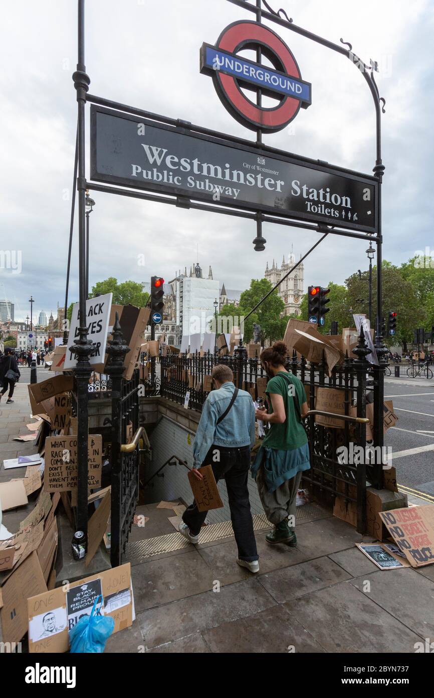 Many protest signs strewn around the entrance to Westminster Station after a Black Lives Matters protest, London, 7 June 2020 Stock Photo