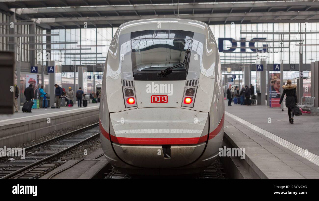 Rear view on an Intercity Express (ICE) - standing inside Munich central station. High speed train of Deutsche Bahn (DB). Stock Photo