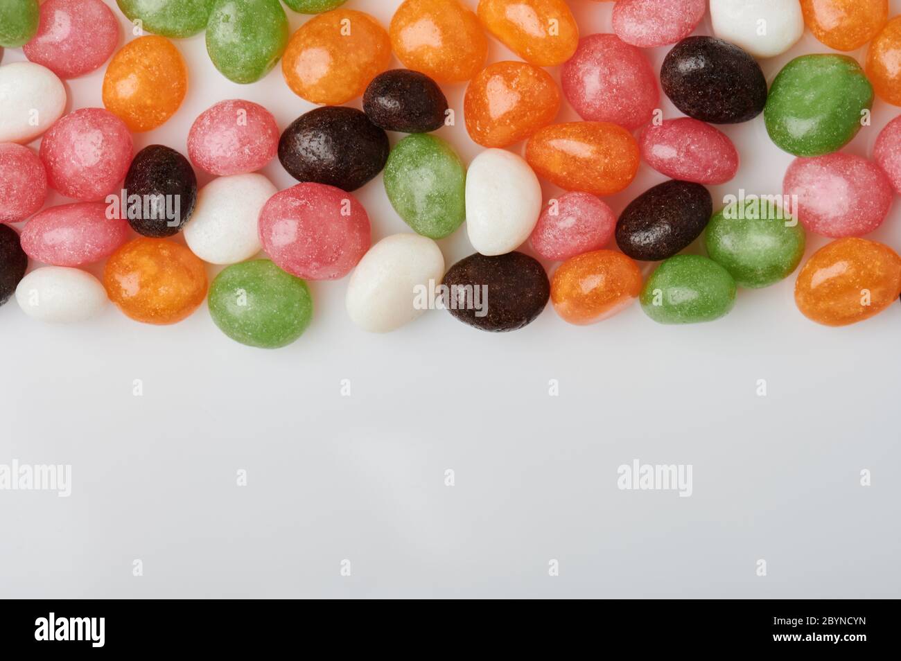 Colorful round candy pattern with copy space in white background Stock ...