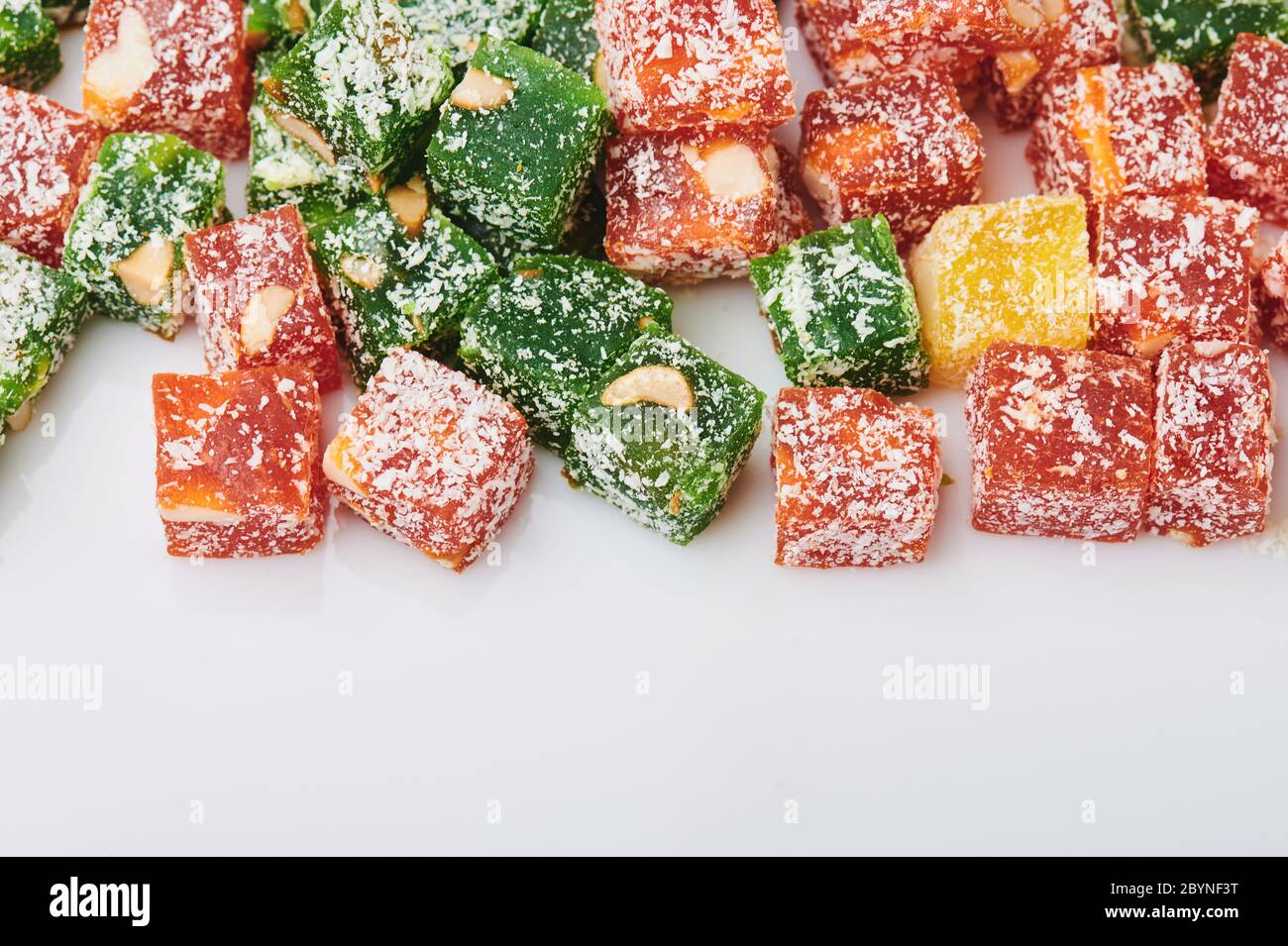 Colorful turkish delight with nuts macro close up view Stock Photo