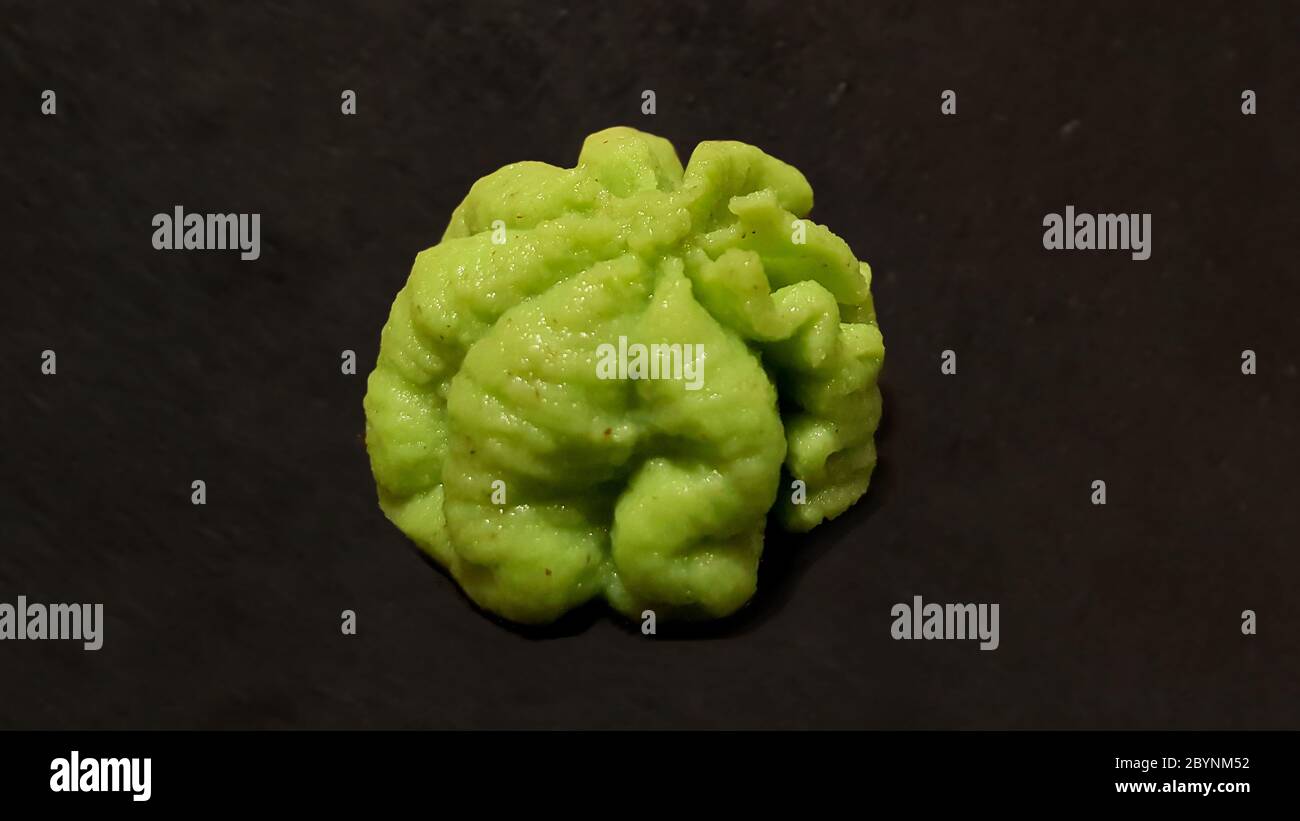 closeup traditional japanese wasabi grated isolate on background Stock