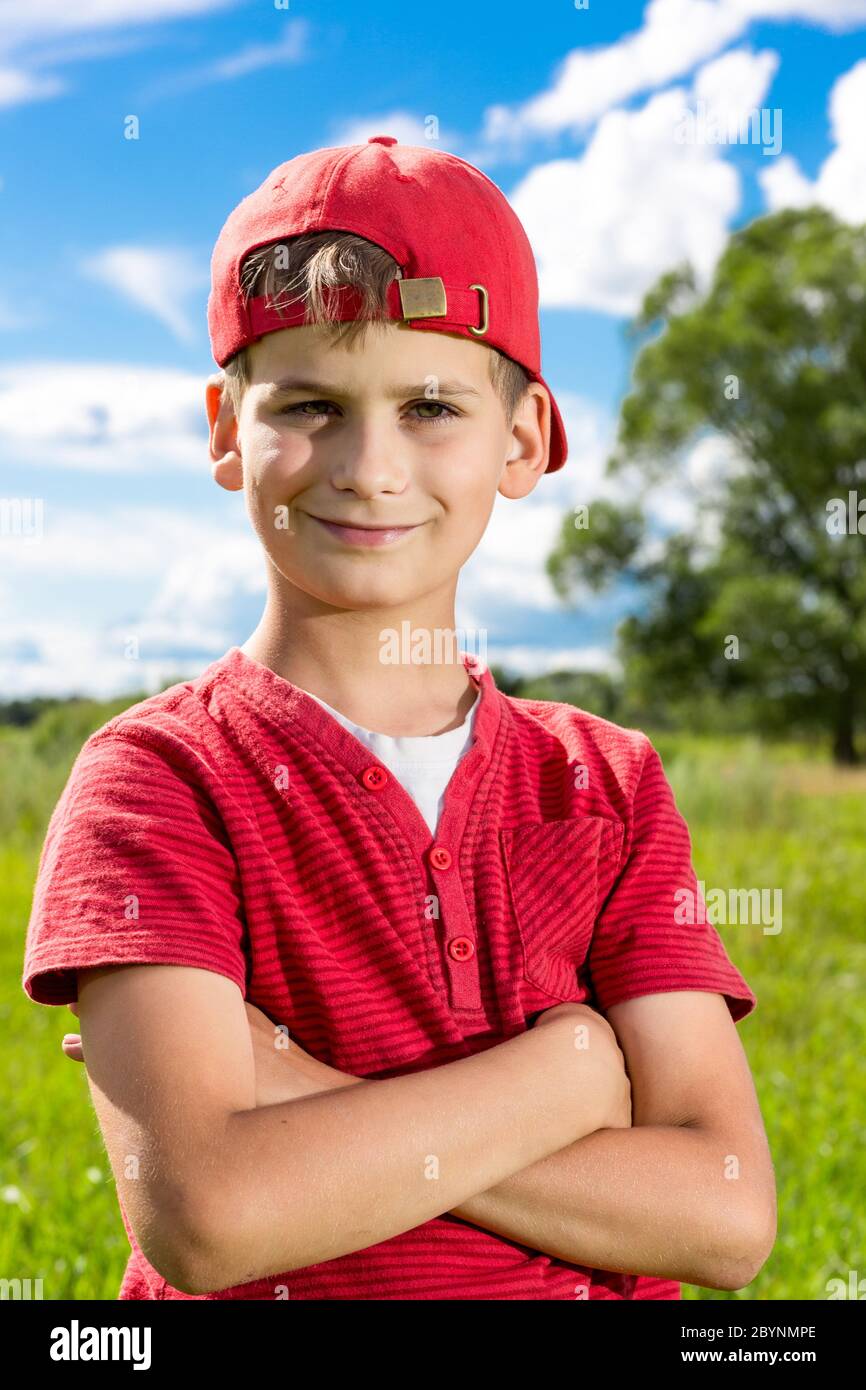 Boy Child Portrait Smiling Cute ten years old outdoor Stock Photo