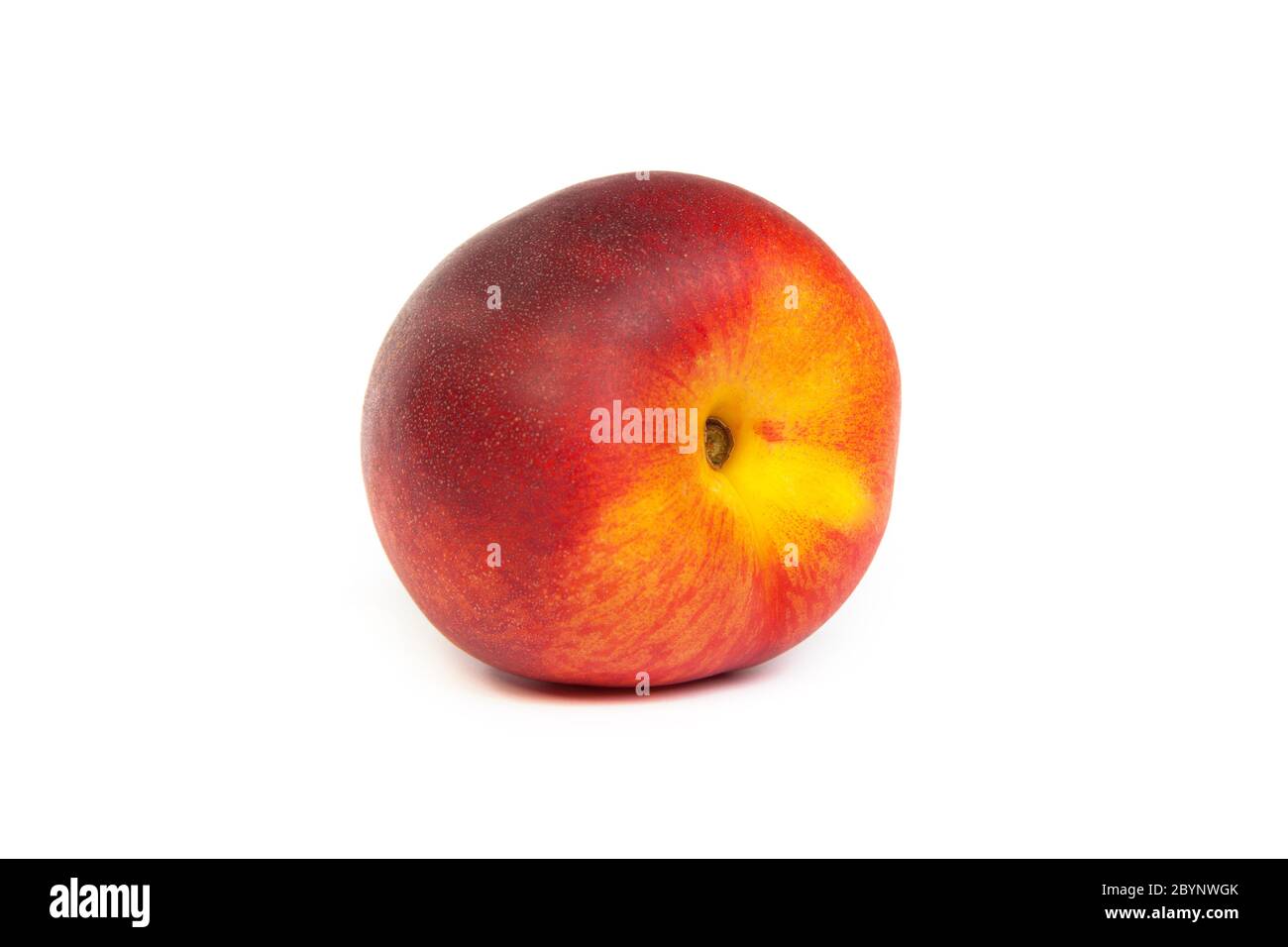 Three fresh nectarines on white Stock Photo