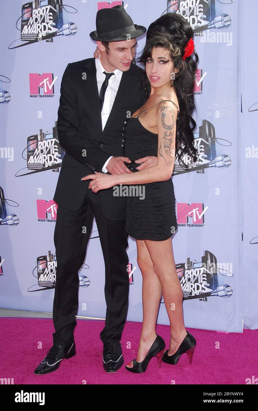 Amy Winehouse and husband Blake Fielder-Civil at the 2007 MTV Movie Awards - Arrivals held at the Gibson Amphitheater, Universal Studios Hollywood in Universal City, CA. The event took place on Sunday, June 3, 2007. Photo by: SBM / PictureLux - File Reference # 34006-6679SBMPLX Stock Photo