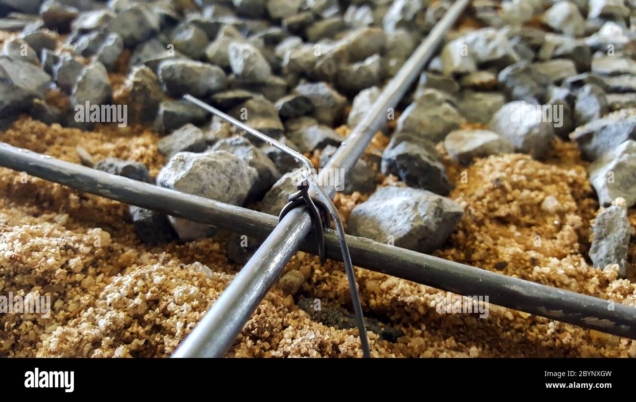 close-up crushed stone sand reinforced steel bar, pour cement Stock ...