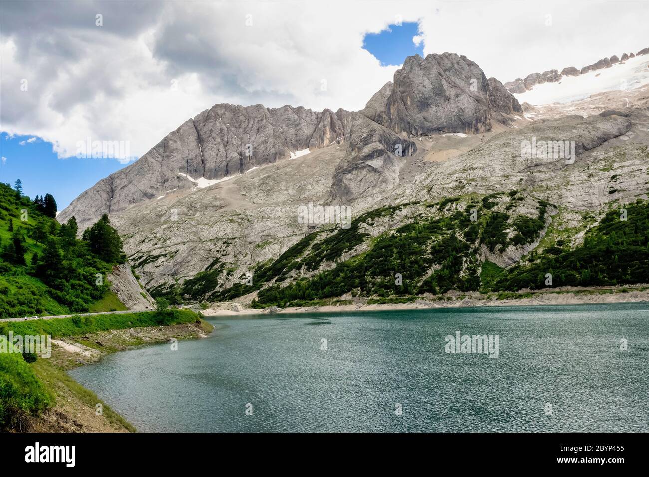 Alpine landscape in the Dolomites, Italy. Glacier Marmolada and Lago di Fedaia. Stock Photo