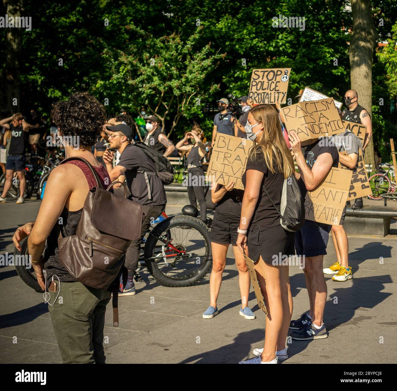 Black Lives Matter demonstrators rally, prior to marching, in Washington Square Park in New York protesting the death of George Floyd, seen on Tuesday, June 9, 2020. (© Richard B. Levine) Stock Photo