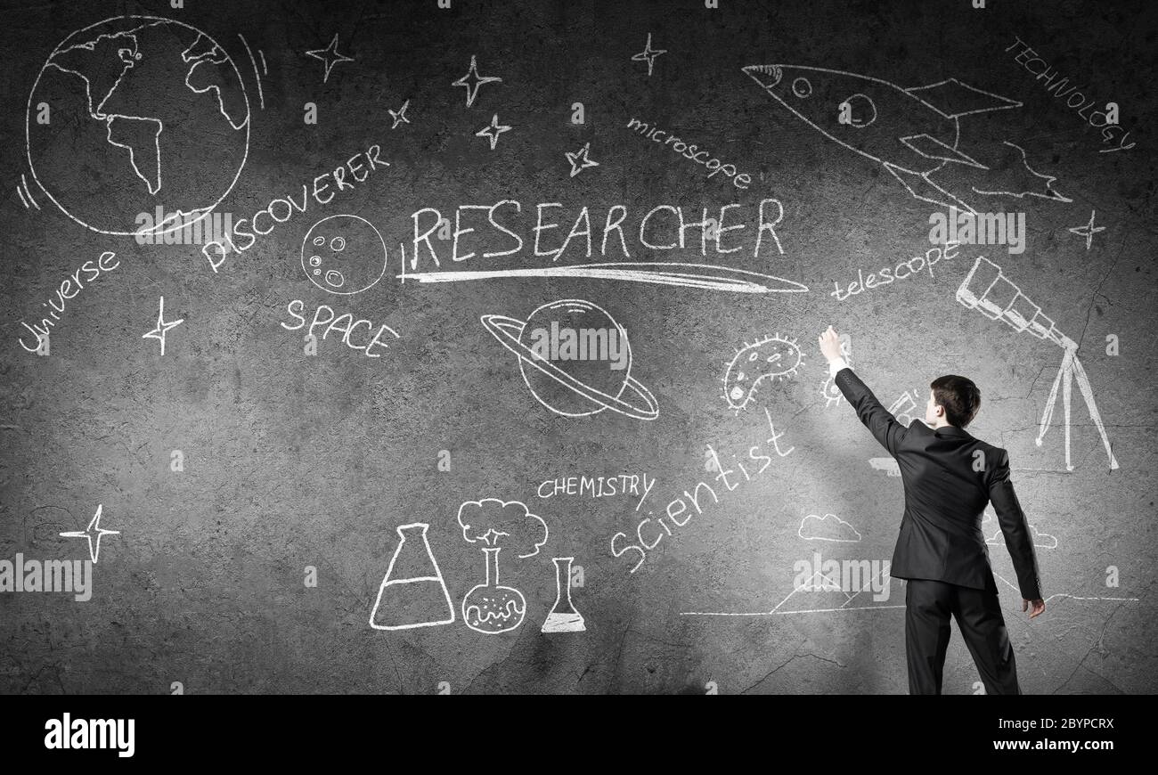 Man draw on chalkboard Stock Photo Alamy