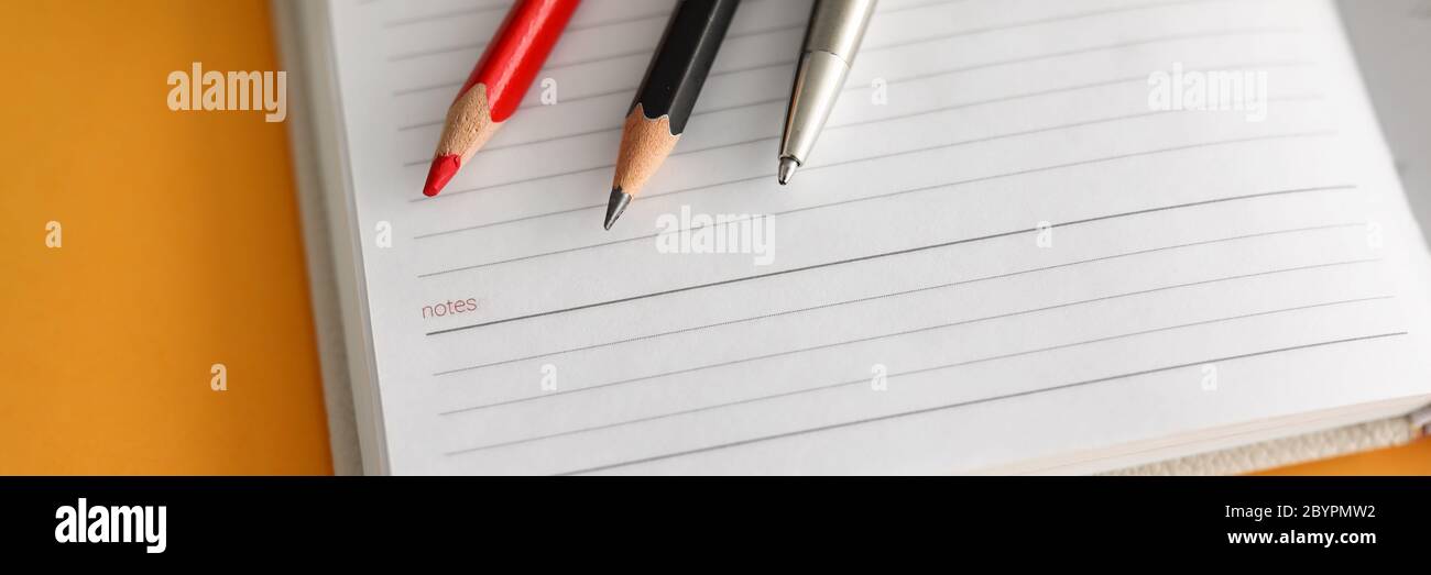 Blank notebook paper, pencil and glasses workplace Stock Photo