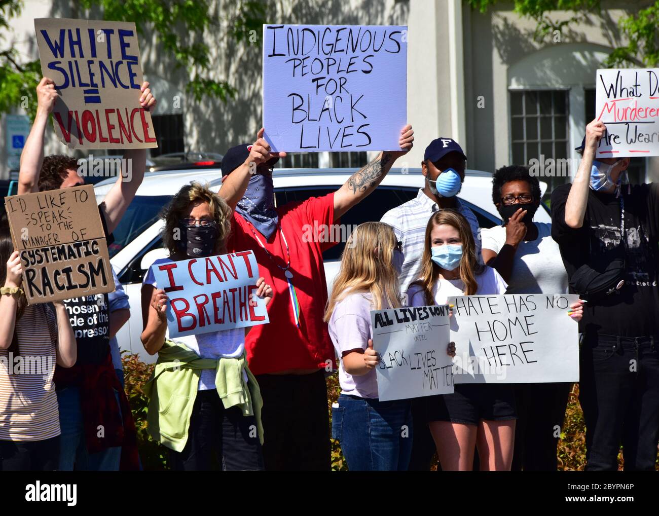 Bismarck, ND, USA. May 29, 2020  People with signs and banners march through streets in the city protesting the death of George Floyd. Stock Photo