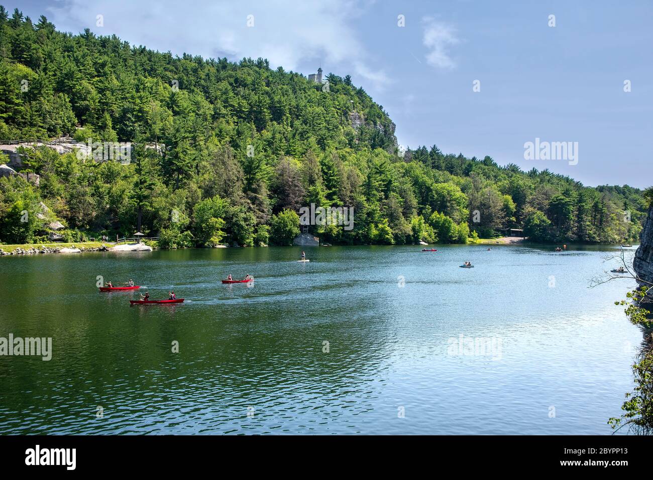 New Paltz, New York - July 11, 2015:  Hotel guests of Mohonk Mountain House boating on Mohonk Lake in upstate New York. Stock Photo