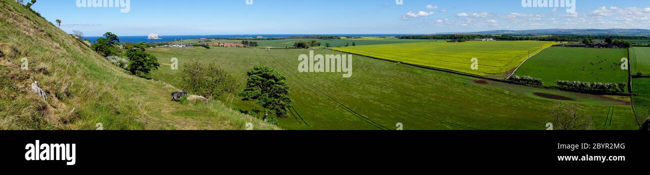 View from South side of North Berwick Law, looking East to Firth of Forth and Bass Rock Stock Photo