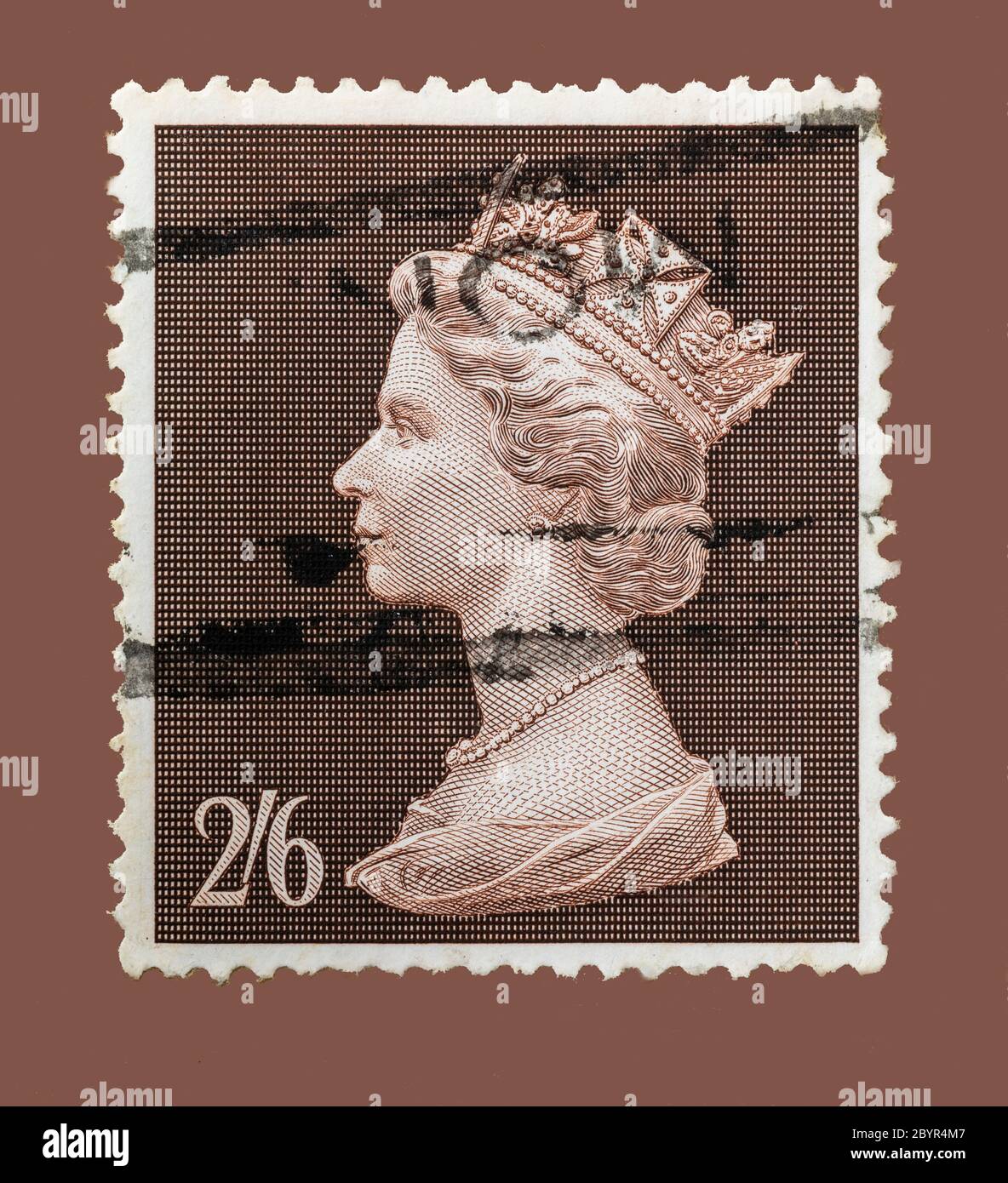 Vintage cancelled postage stamp form the UK circa 1969. Face value 2 shillings and sixpence or half a crown. Fairly plain showing Queen Elizabeth. Stock Photo
