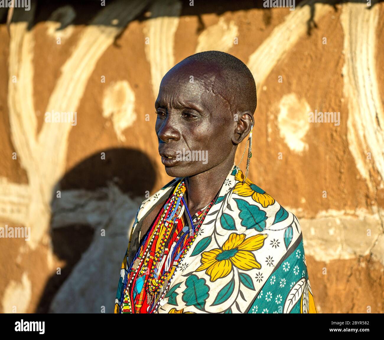 Portrait of an old Masai tribe woman in traditional clothes. Close-up. Tanzania, East Africa, August 12, 2018. Stock Photo
