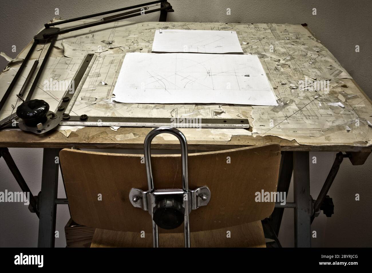 drawing table with blueprints, architect table, vintage, sketches close