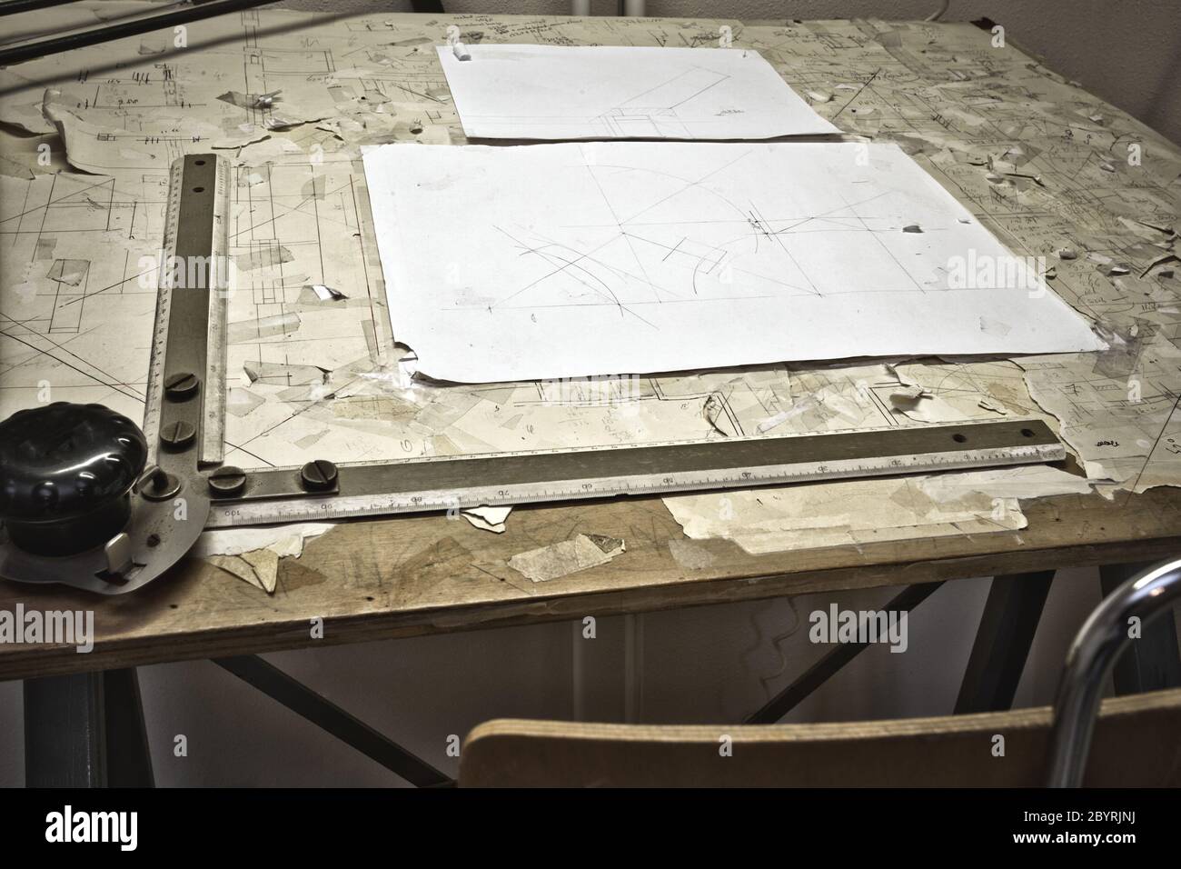 drawing table with blueprints, architect table, vintage, sketches close