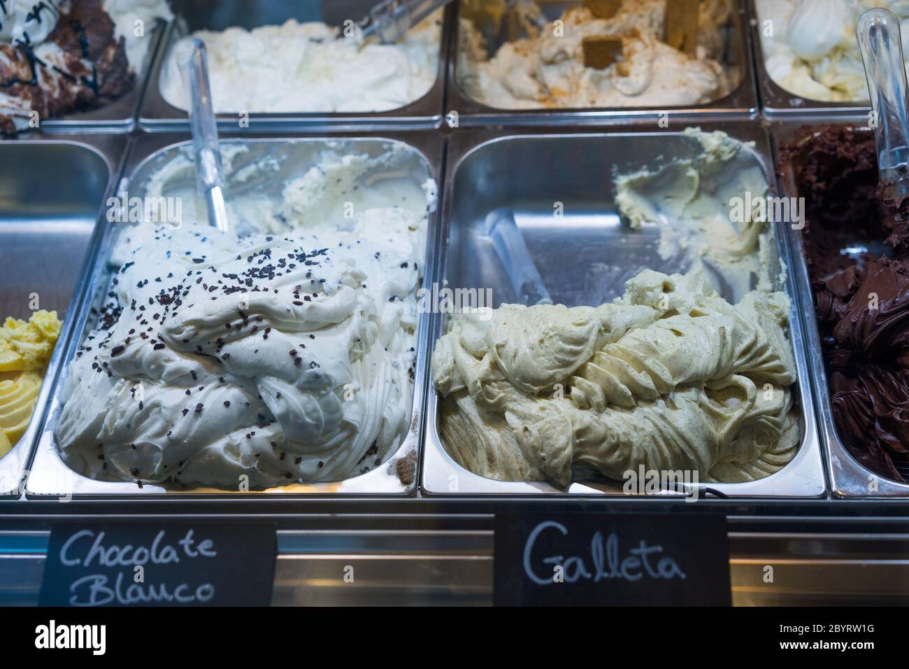 Italian ice cream on display in metal tubs Stock Photo