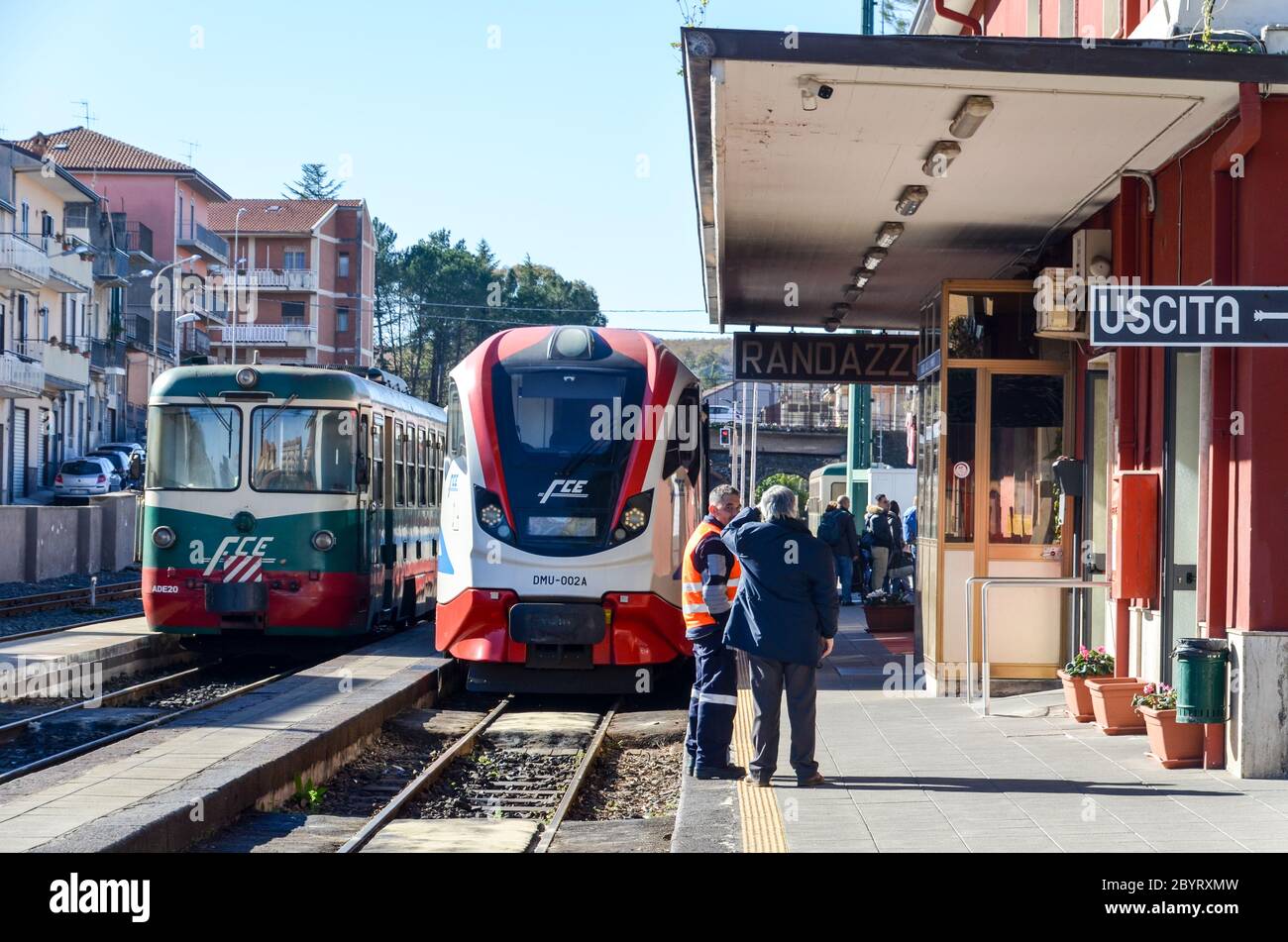 FCE old and modern trains, at the train station of Randazzo, along the Ferrovia Circumetnea, train line around the Mount Etna, Sicily, Italy Stock Photo